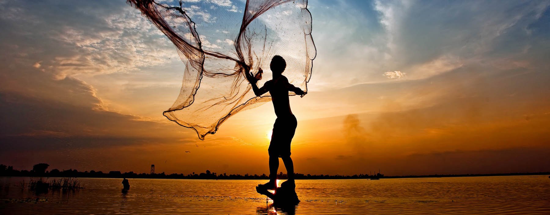 Visser bij het Ton Le Sap meer, Cambodja