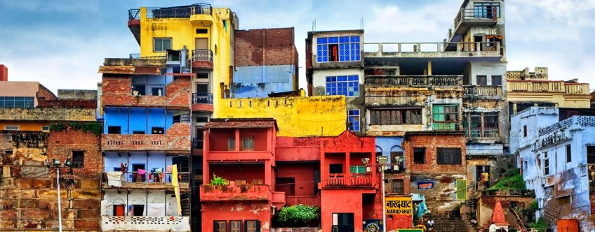in, varanasi, chaotic colorful houses on the banks of river ganges.jpg